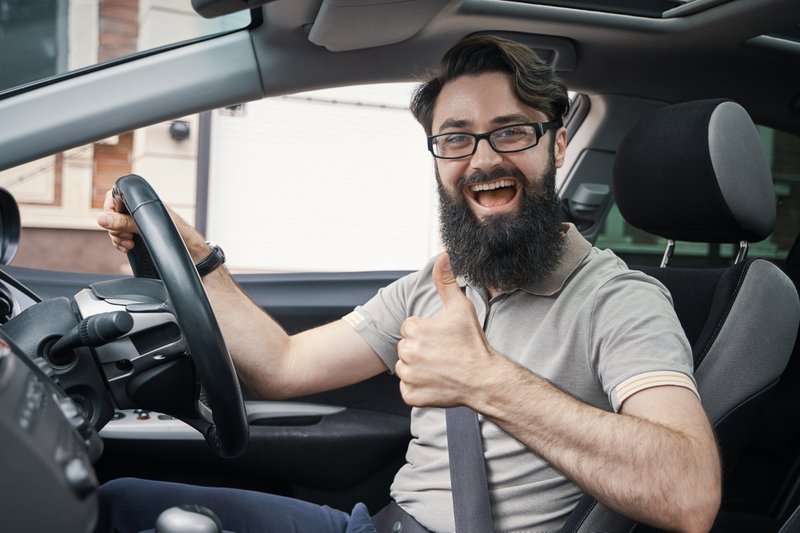 Man%20smiling%20in%20car