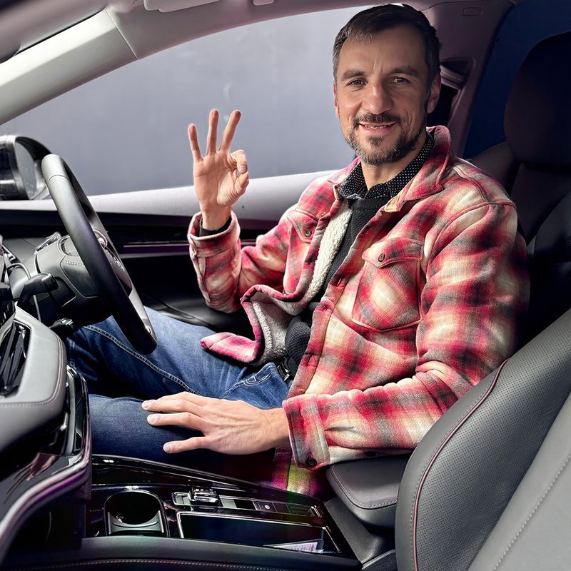 Uber driver pictured inside the Skoda Enyaq 85 Edition Suite