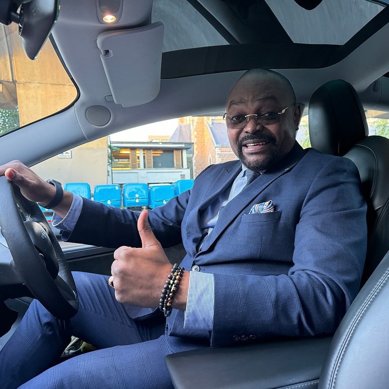 Uber Driver inside Tesla Model 3